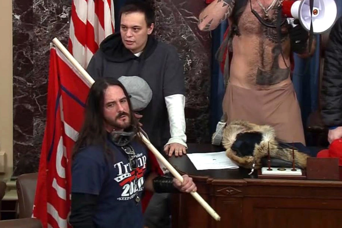 Man who stood in Senate chamber with Trump flag faces first felony ...