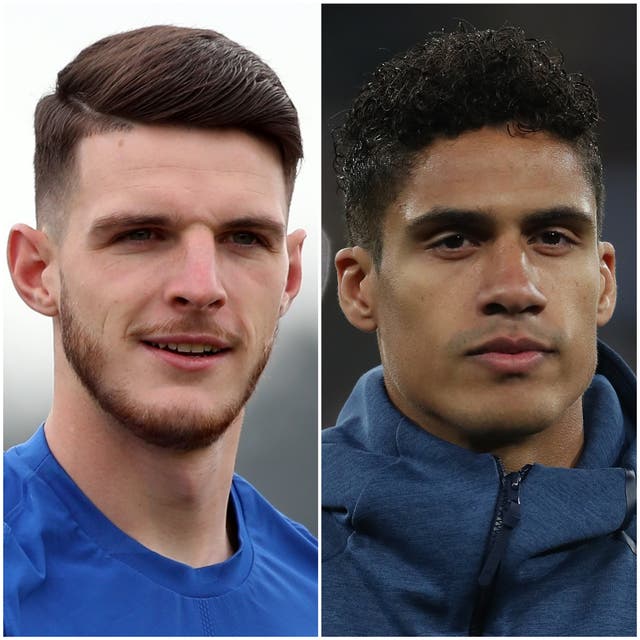 <p>Declan Rice and Raphael Varane</p>