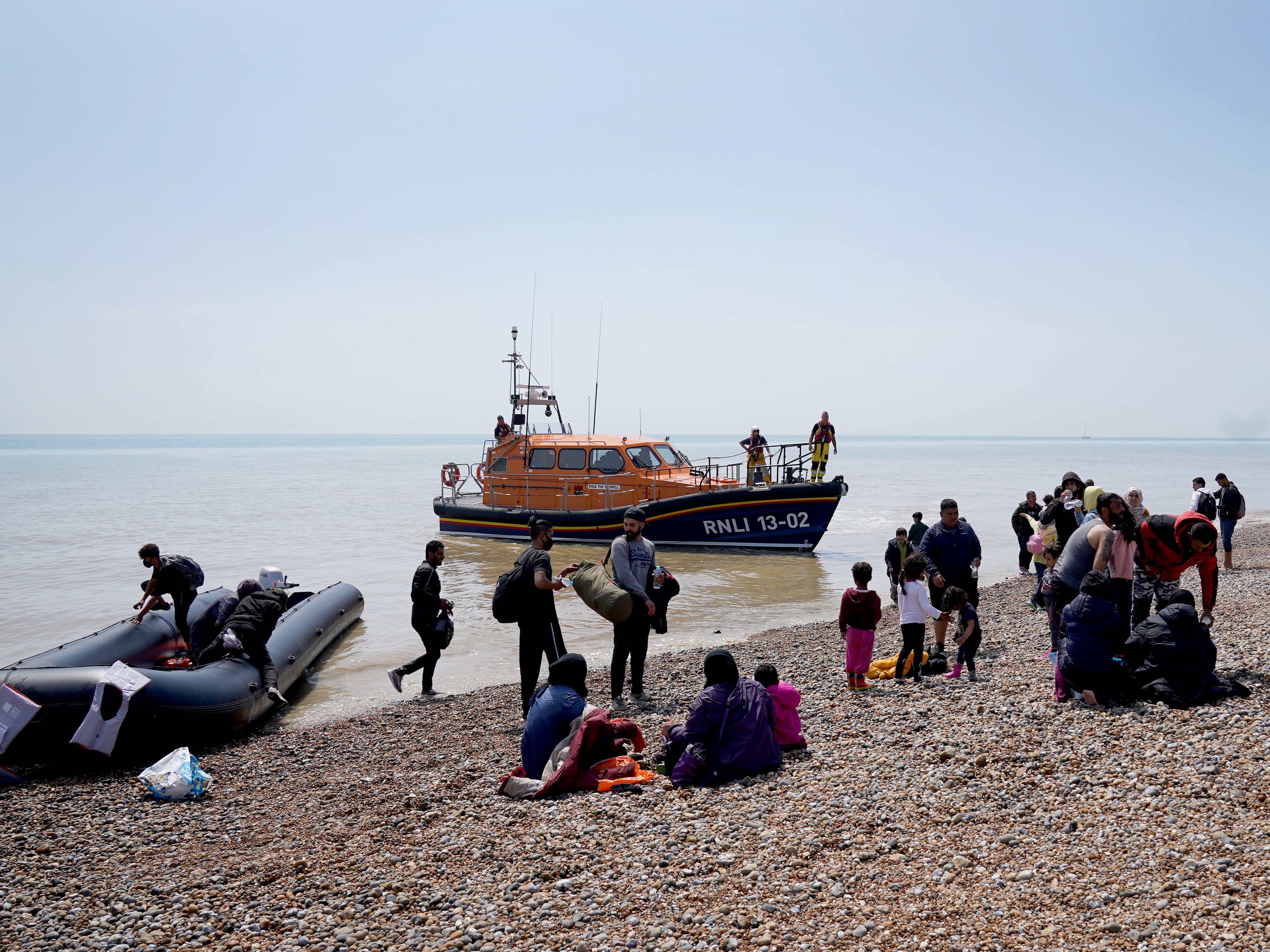 Migrants land on the beach in Dungeness, Kent, on Monday afternoon
