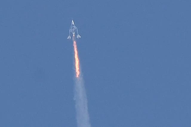 <p>The Virgin Galactic SpaceShipTwo space plane Unity and mothership separate as they fly way above Spaceport America in New Mexico on July 11, 2021</p>