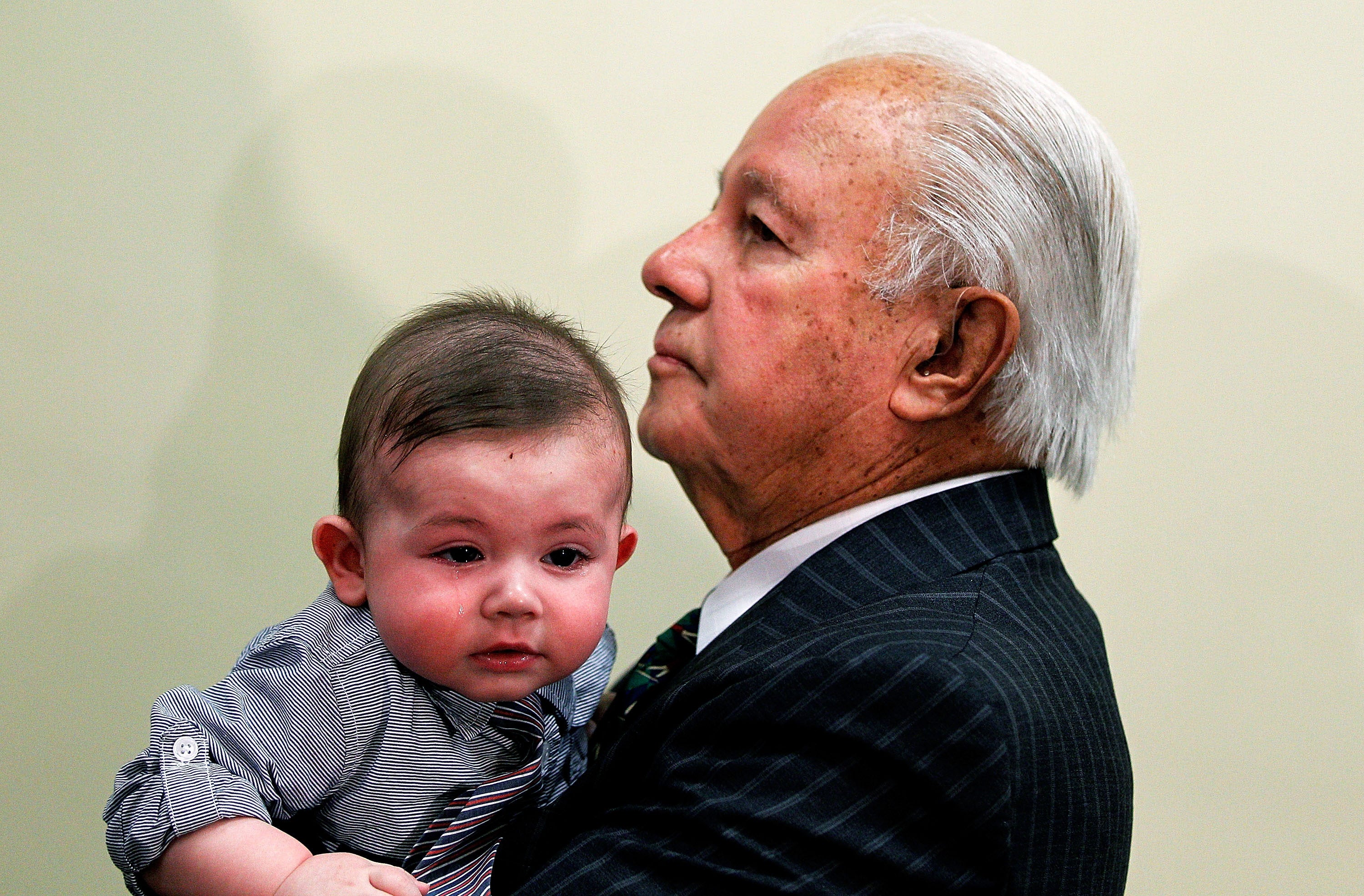 Edwards, 86, with his son Eli in 2014