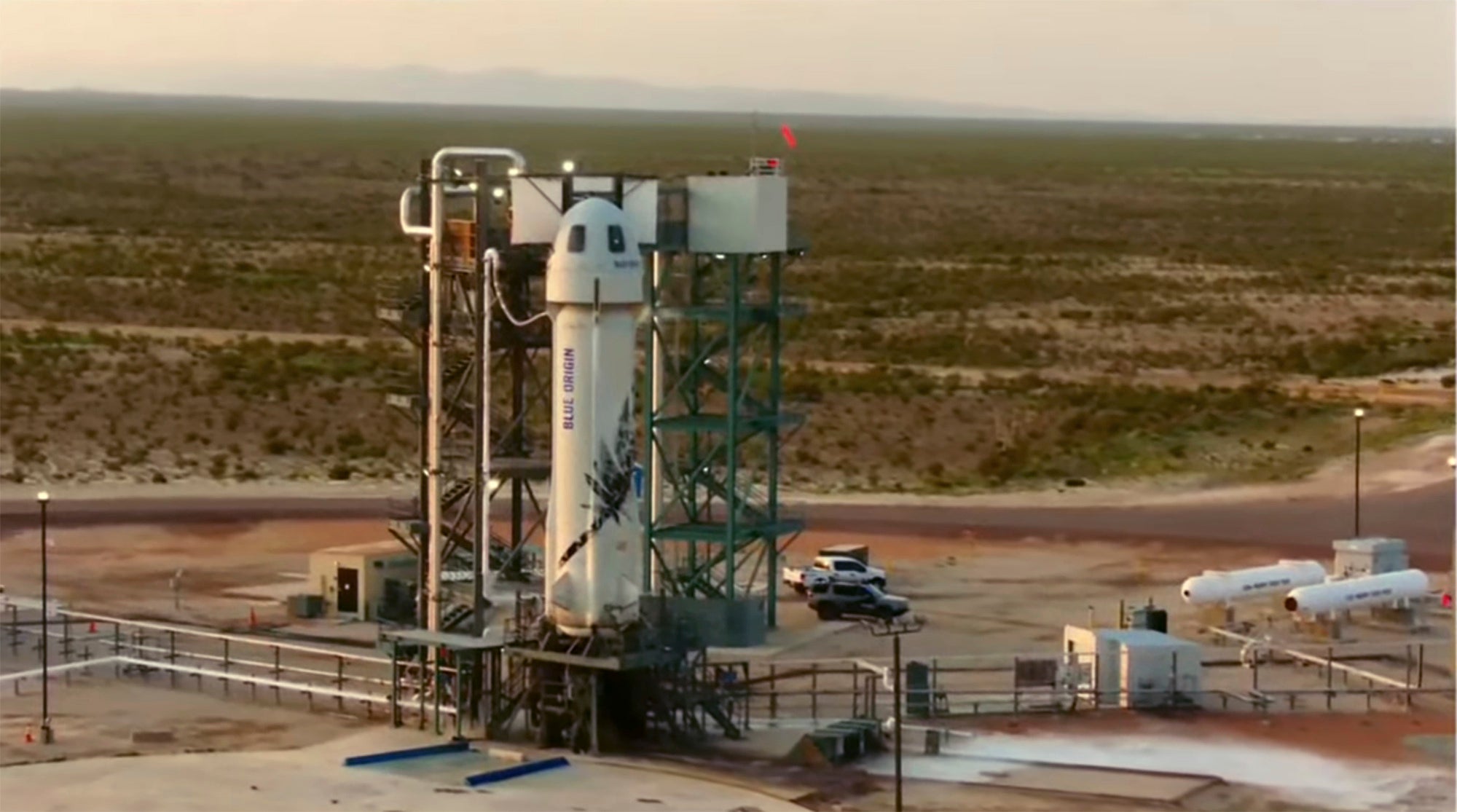 Blue Origin's New Shepard rocket sits on a spaceport launch pad near Van Horn, Texas
