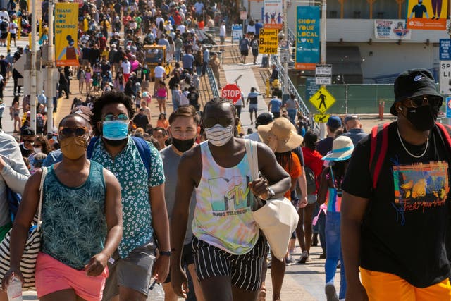 <p>People wearing face masks in California</p>