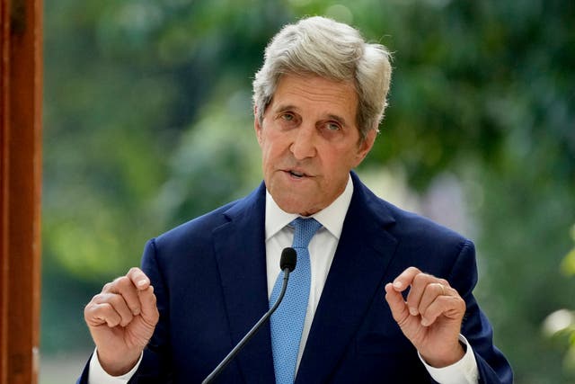 <p>Kerry delivers a speech at the Royal Botanic Gardens in Kew yesterday</p>