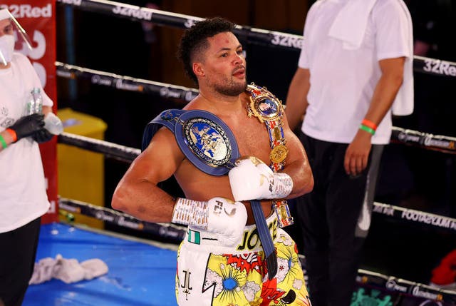 <p>Joyce celebrates victory over Daniel Dubois at London’s Church House in November 2020 </p>