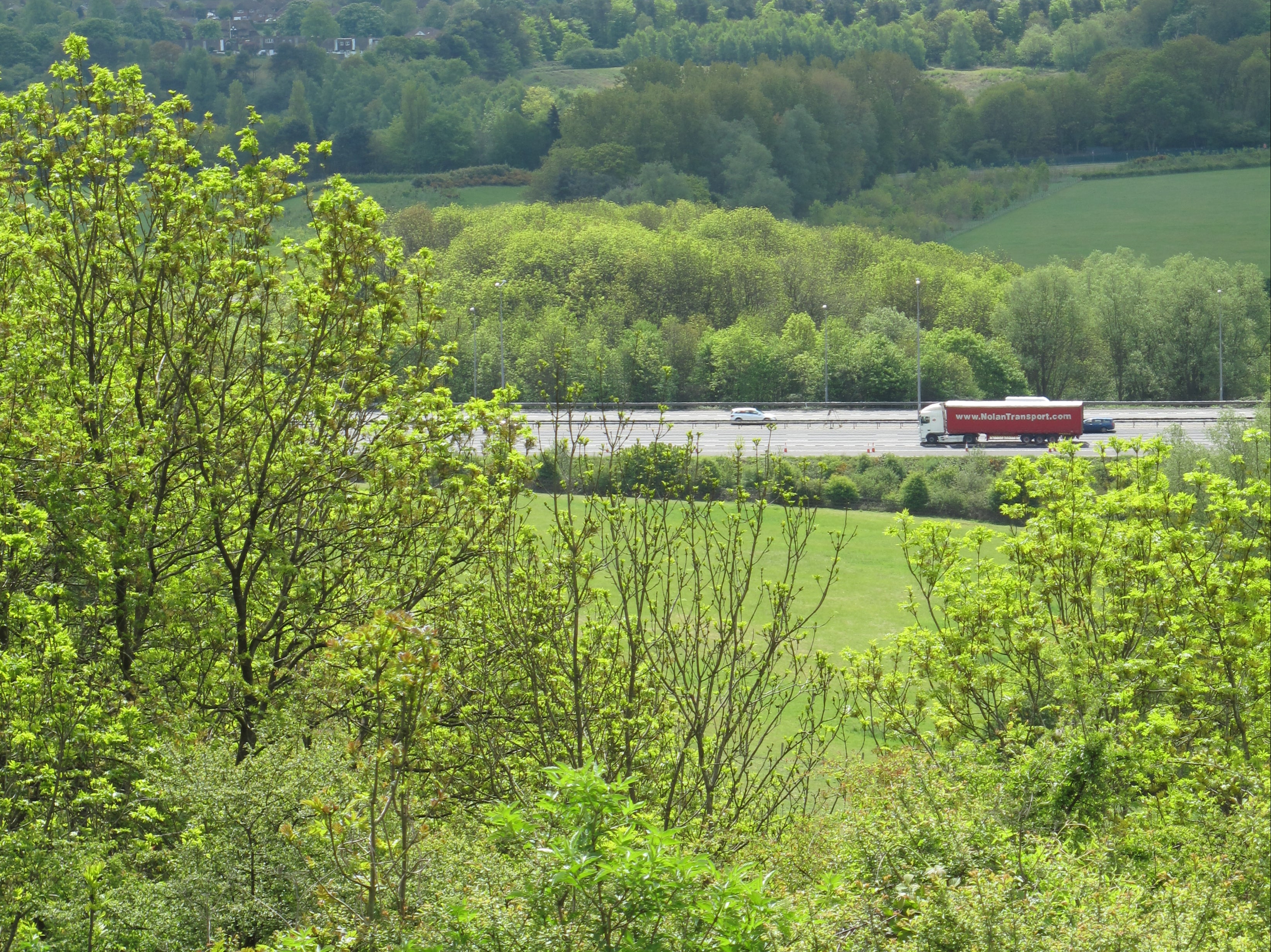 Green and pleasant: early or late starts will help to avoid congestion on roads such as the M25