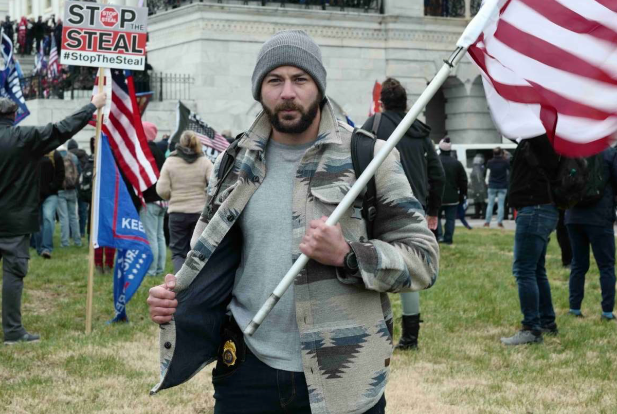DEA agent arrested after filming himself with firearm while storming Capitol DEA agent arrested after filming himself with firearm while storming Capitol