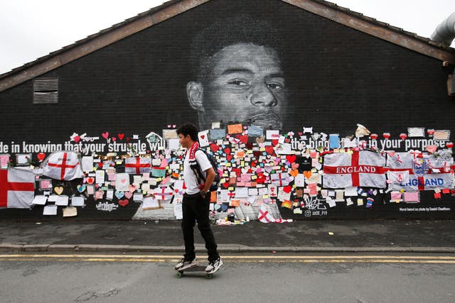 <p>Marcus Rashford mural covered with messages of support after it was defaced following the Euro 2020 Final between Italy and England</p>