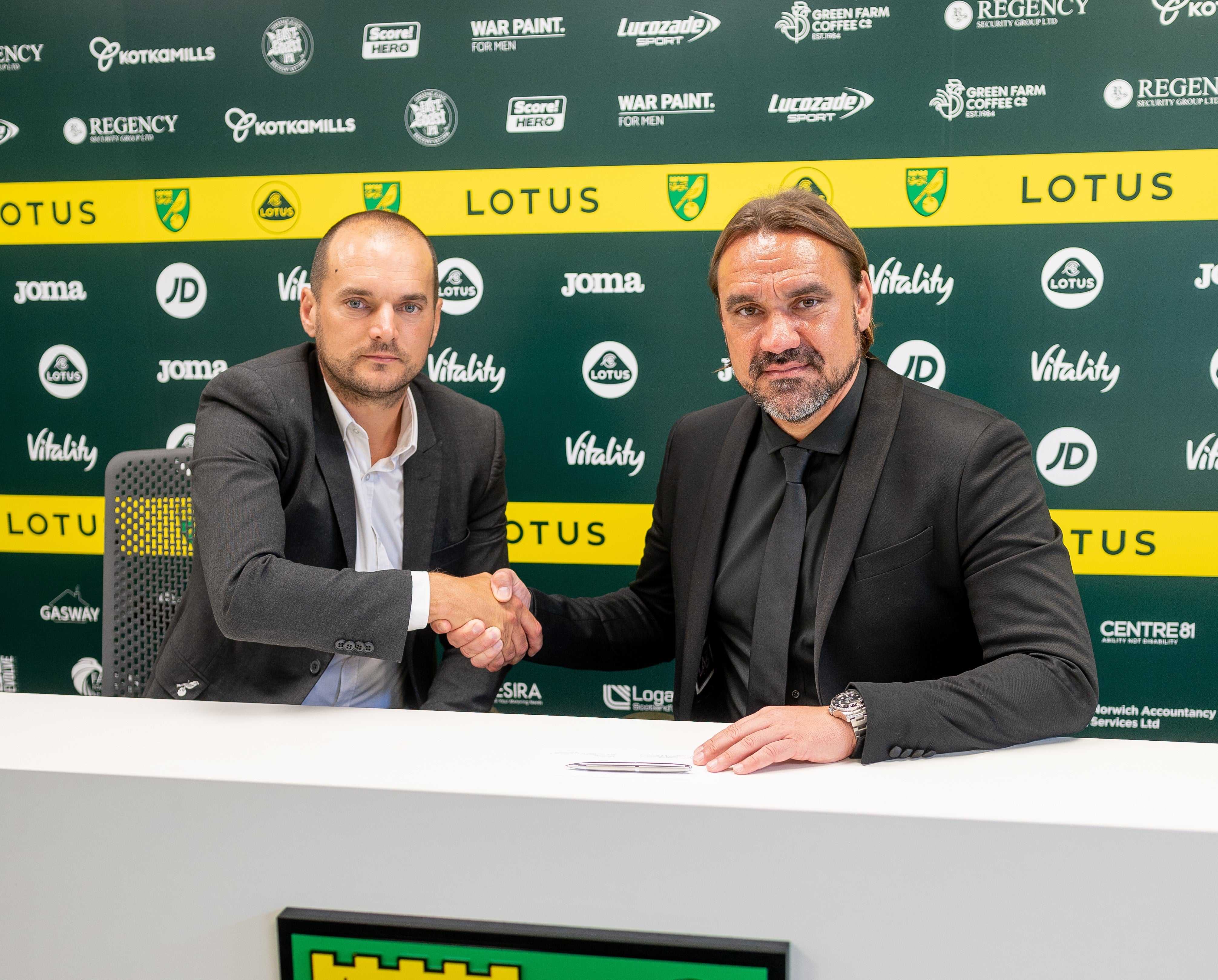 Norwich head coach Daniel Farke has signed a new contract at the club, pictured on right, alongside sporting director Stuart Webber