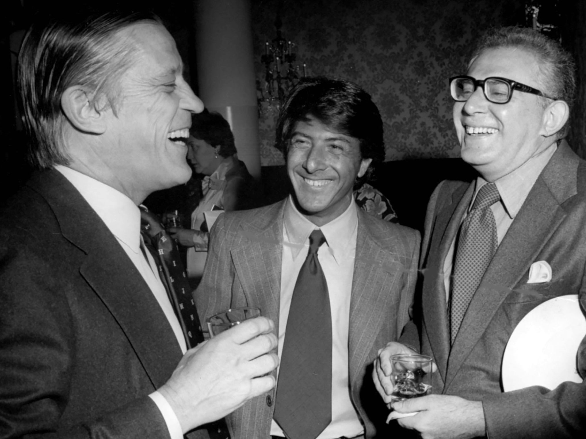 Washington Post executive editor Ben Bradlee (left) and Dustin Hoffman with Rosenfeld (right)
