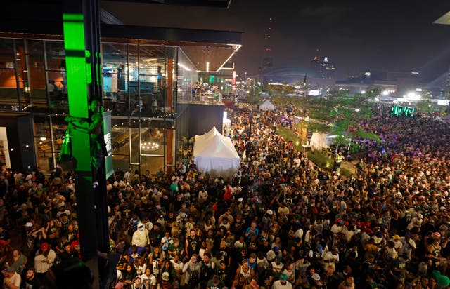 <p>Fans cheer as the Milwaukee Bucks defeated the Phoenix Suns in Game 6 of the NBA basketball finals to win the championship, Tuesday, July 20, 2021, in Milwaukee.</p>