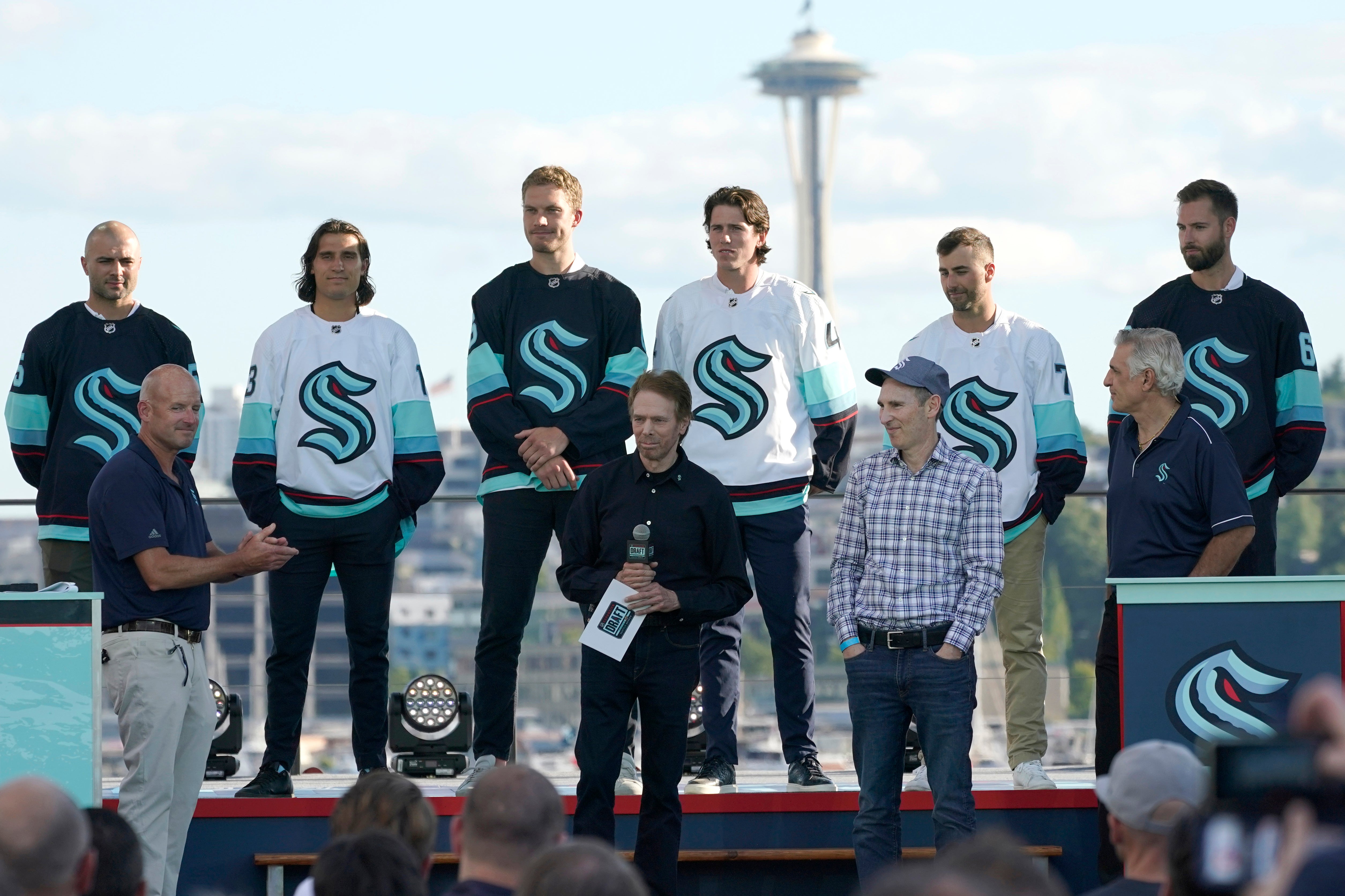 Seattle Kraken's Jordan Eberle, right, and Jared McCann celebrate