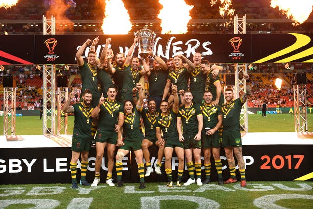 <p>Australia pose with the trophy after the final of the 2017 Rugby League World Cup (Gregg Porteous/PA)</p>