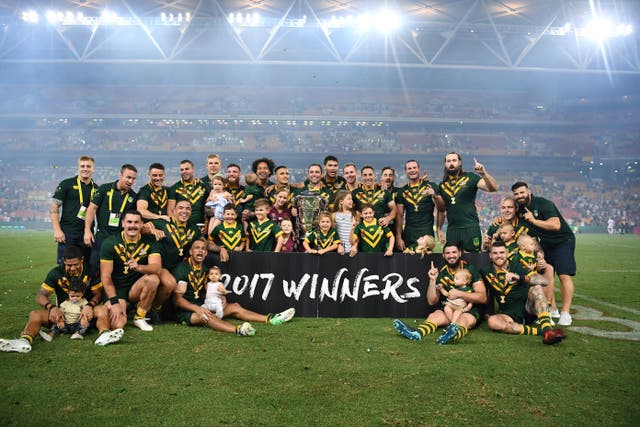 Handout photo provided by NRL Imagery of Australia posing with the trophy after the final of the 2017 Rugby League World Cup at the Suncorp Stadium, Brisbane