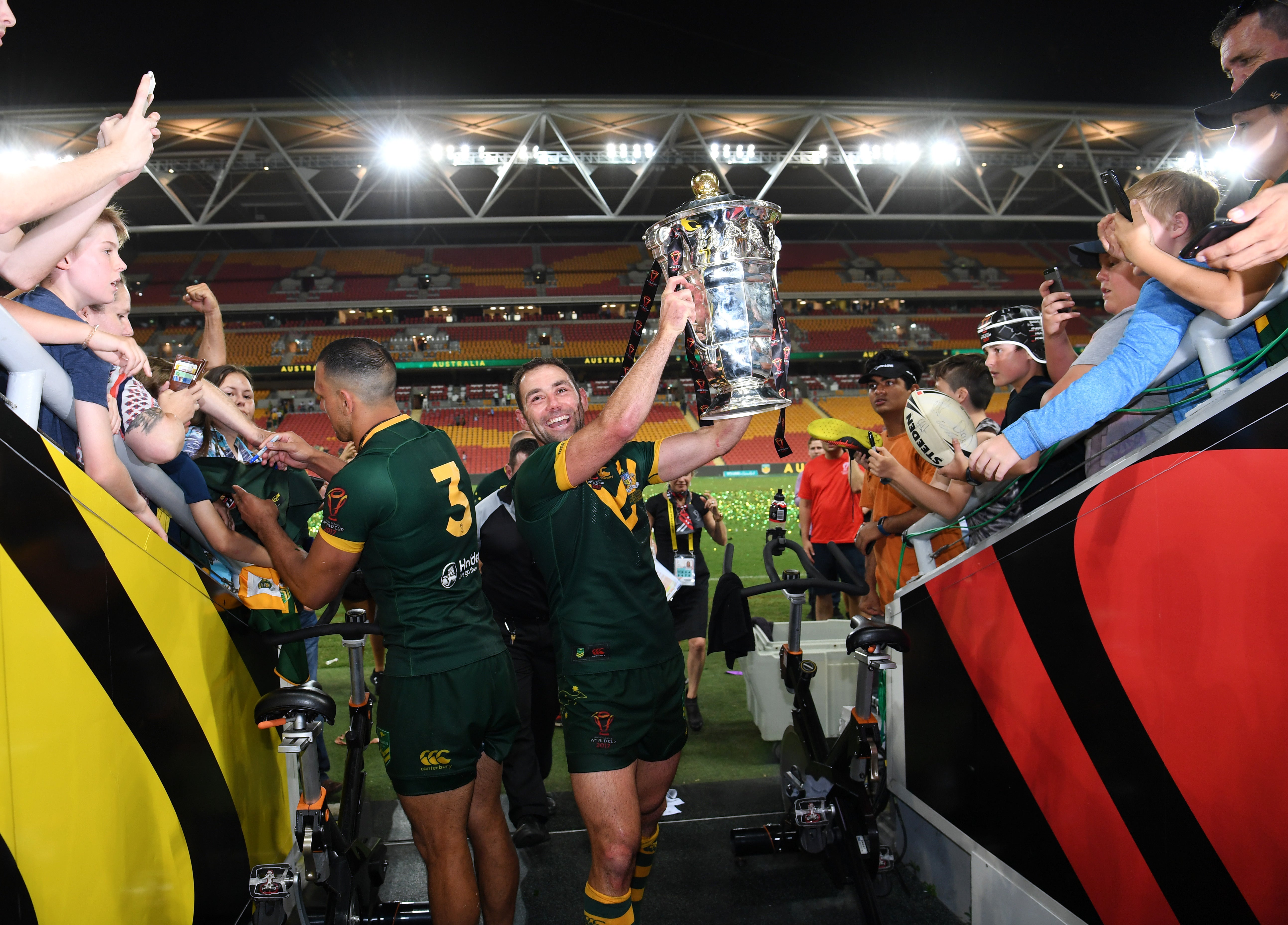 Handout photo provided by NRL Imagery of Australia’s Cameron Smith poses with the trophy after the final of the 2017 Rugby League World Cup at the Suncorp Stadium, Brisbane .