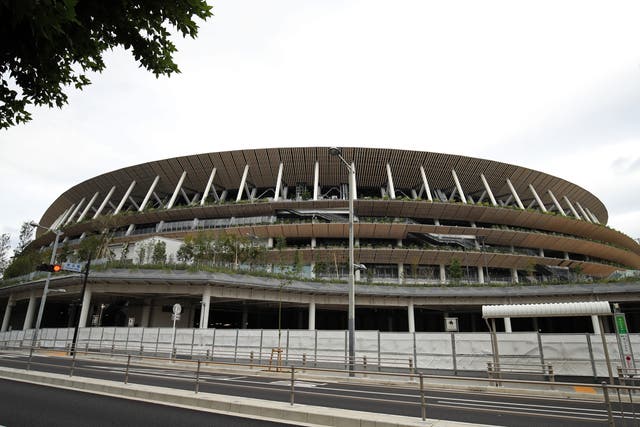 <p>Tokyo’s Olympic Stadium will host an opening ceremony with a difference on Friday (Adam Davy/PA)</p>