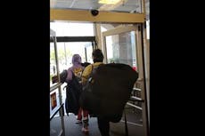 Viral video appears to show two men casually walking out of Los Angeles-area TJ Maxx with arms full of stolen goods