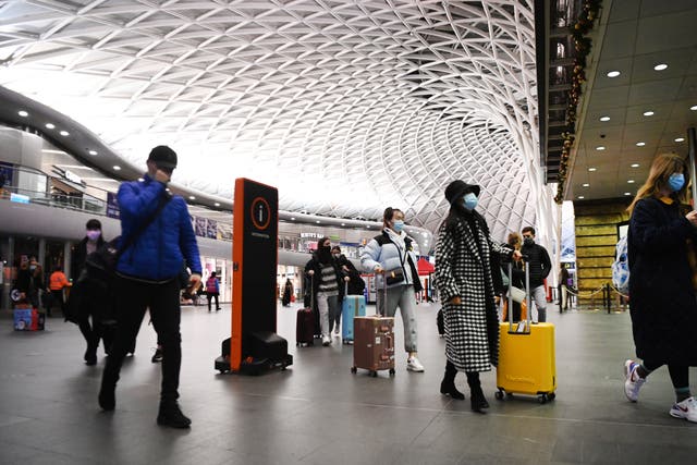 <p>People at Kings Cross train station in London in December 2020 [stock photo] </p>
