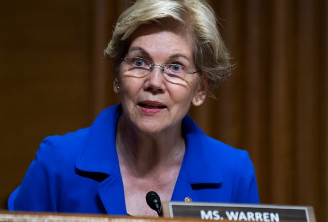 <p>Senator Elizabeth Warren questions IRS Commissioner Charles Rettig during a Senate Finance Committee hearing 8 June 2021</p>