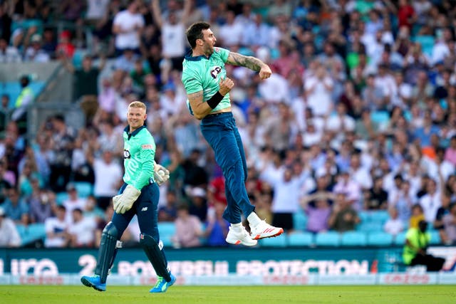 <p>Reece Topley celebrates after taking a wicket (John Walton/PA)</p>