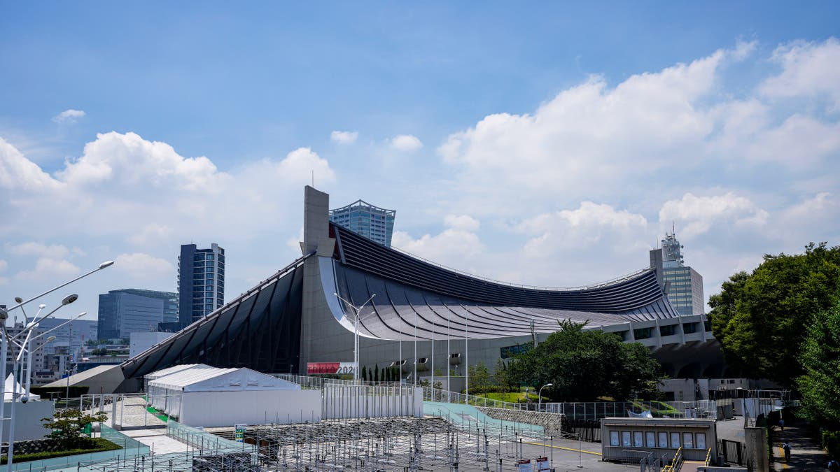As Tokyo Games open, can Olympic flame burn away the funk?