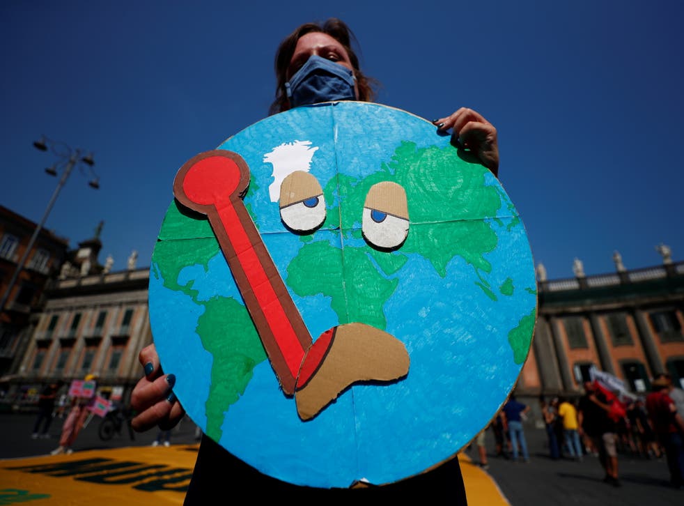 <p>Climate activists including Extinction Rebellion and Fridays for Future stage a protest in July demanding more action on the climate crisis</p>