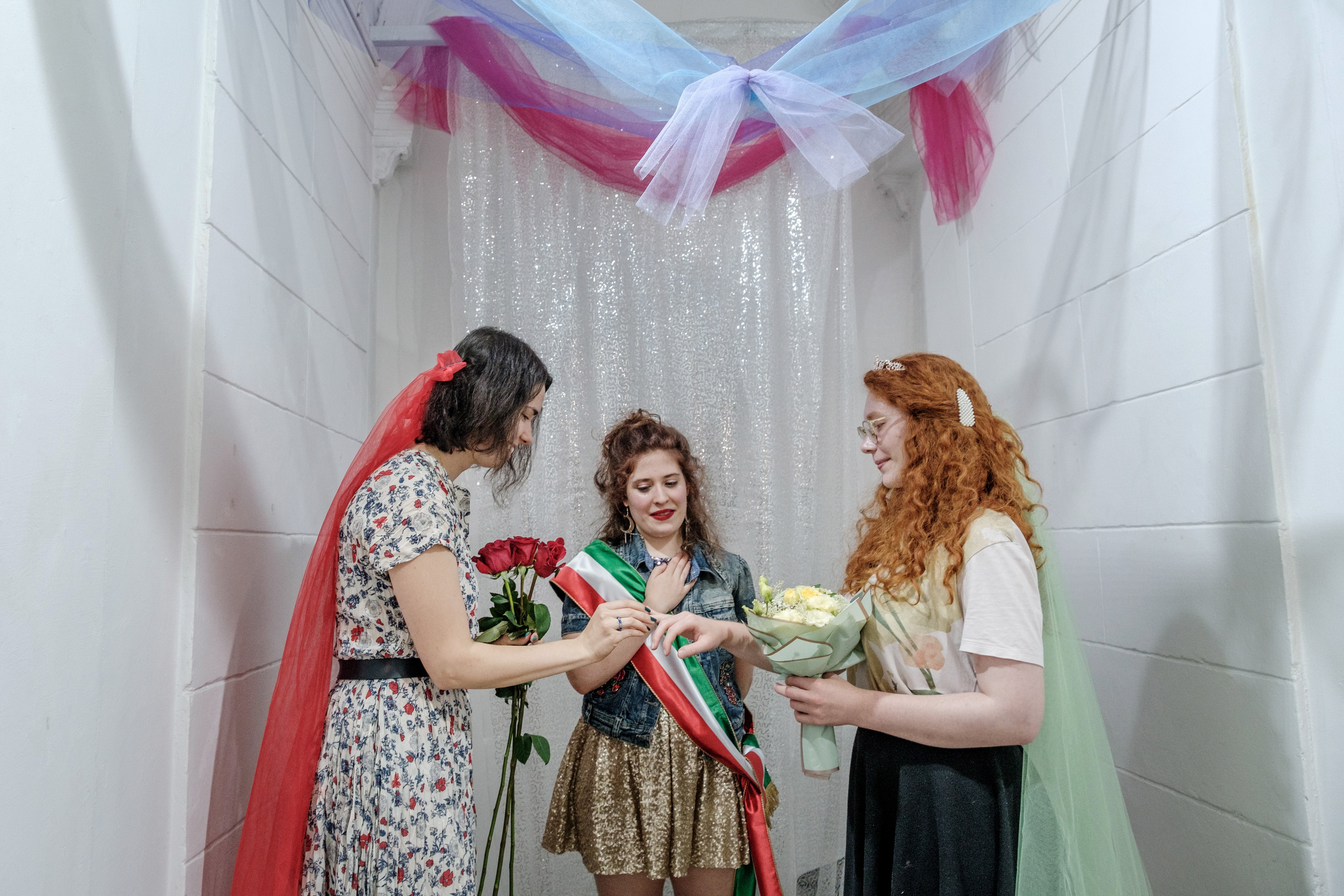 Lika and Fanny (right) at a secret vow ceremony with Ilka Dobrovits (centre) organiser and master of ceremonies. Hungary bans same-sex marriage