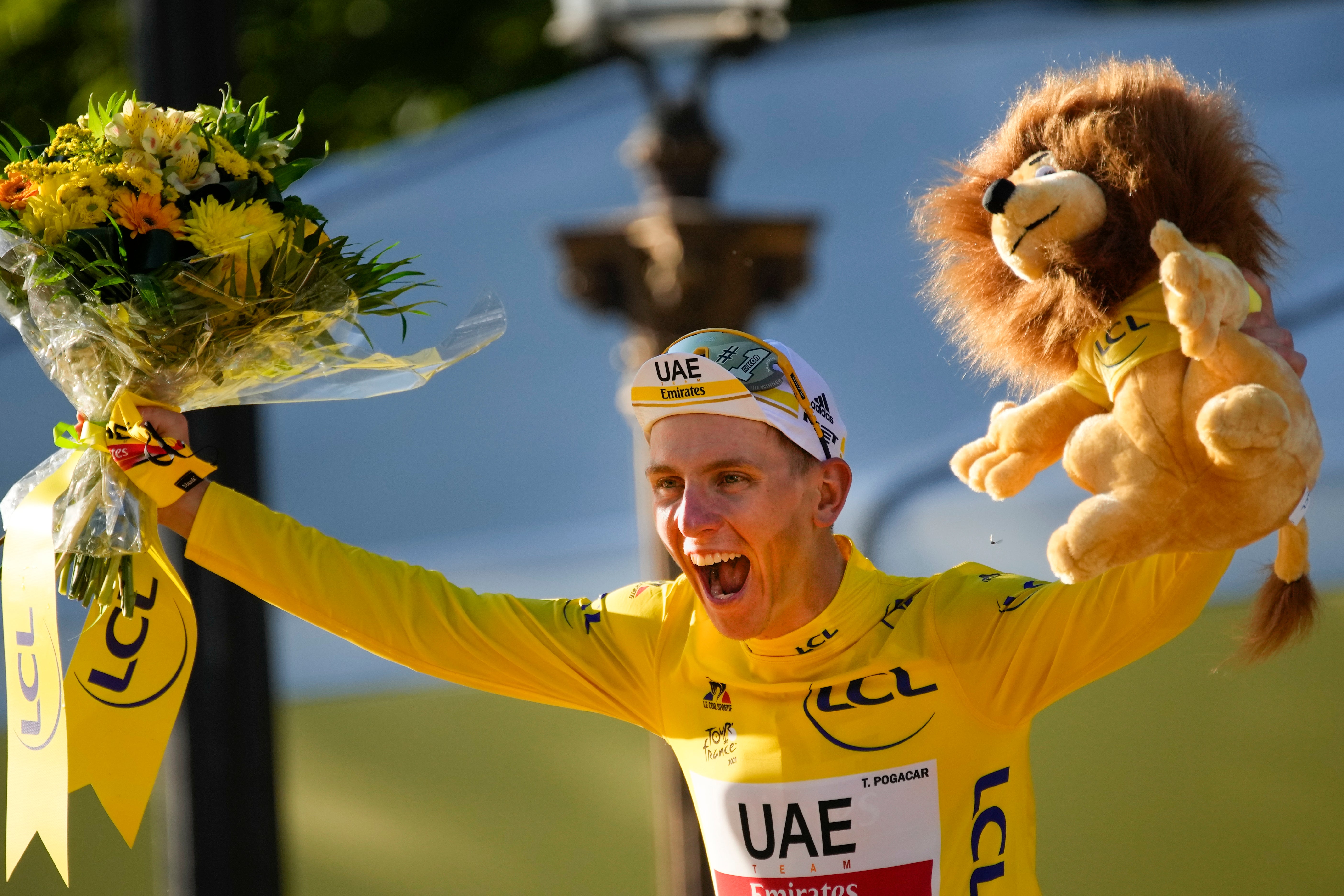 Pogacar celebrates winning the 2021 Tour de France