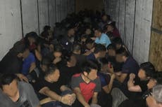 Texas couple accused of trying to smuggle 89 migrants across Mexico border in stolen trailer