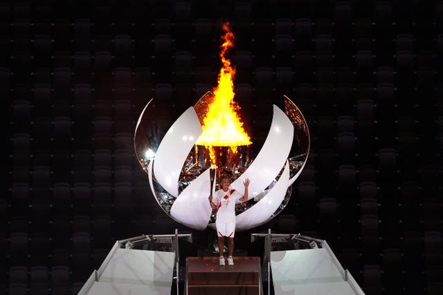 <p>Naomi Osaka lights the Olympic flame (Mike Egerton/PA)</p>