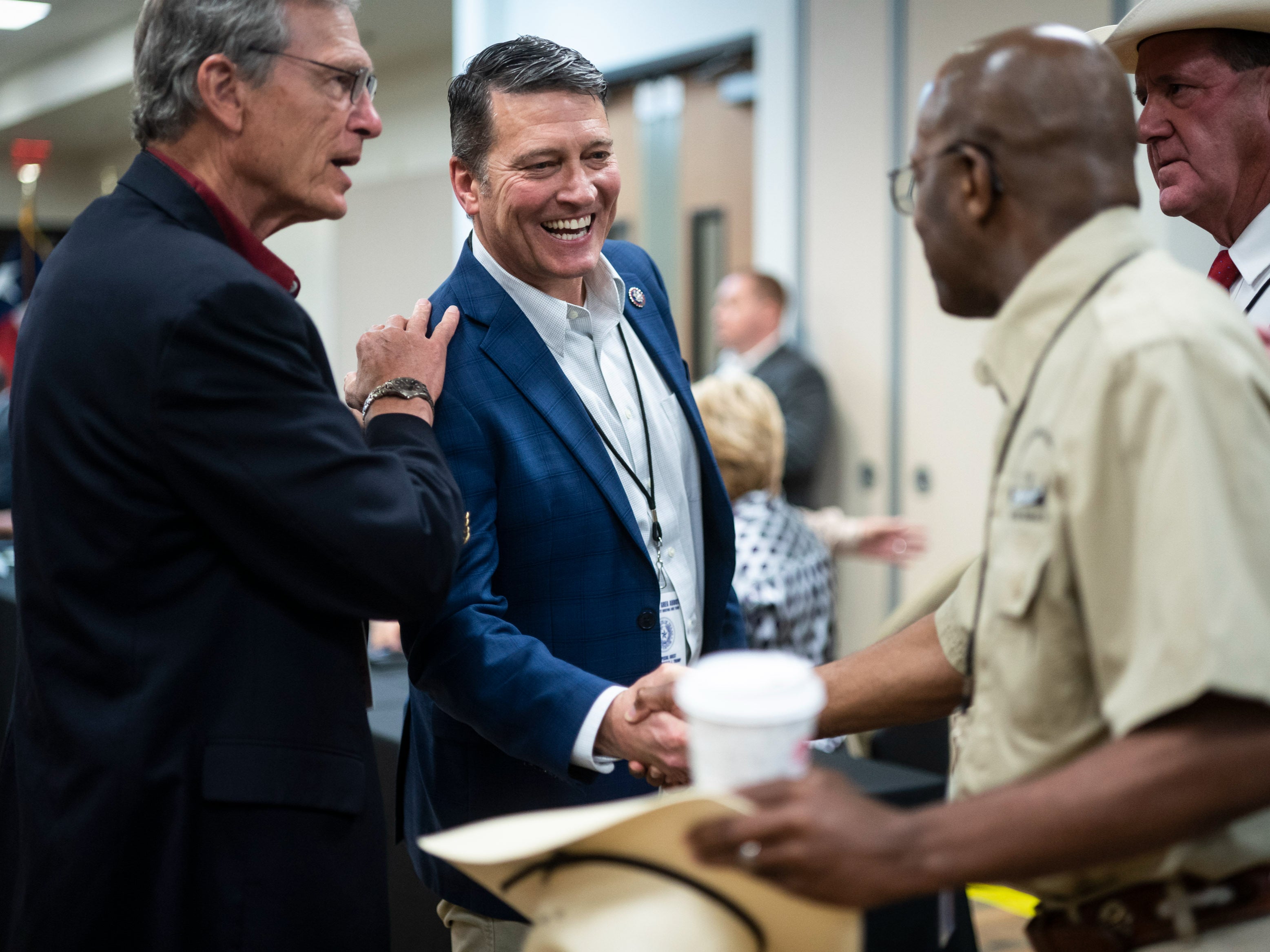 <p>Rep. Ronny Jackson, R-Texas, greets others before former President Donald Trump arrives at a security briefing on June 30, 2021 in Weslaco, Texas. </p>