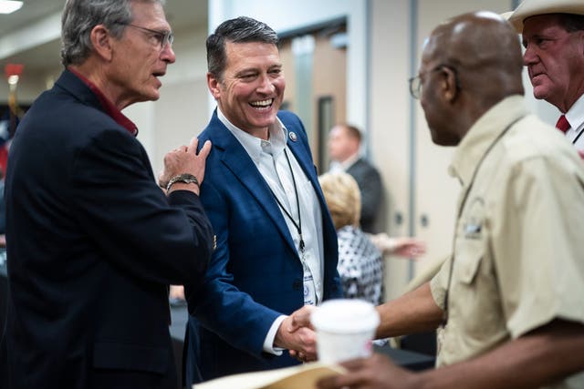 <p>Rep. Ronny Jackson, R-Texas, greets others before former President Donald Trump arrives at a security briefing on June 30, 2021 in Weslaco, Texas. </p>