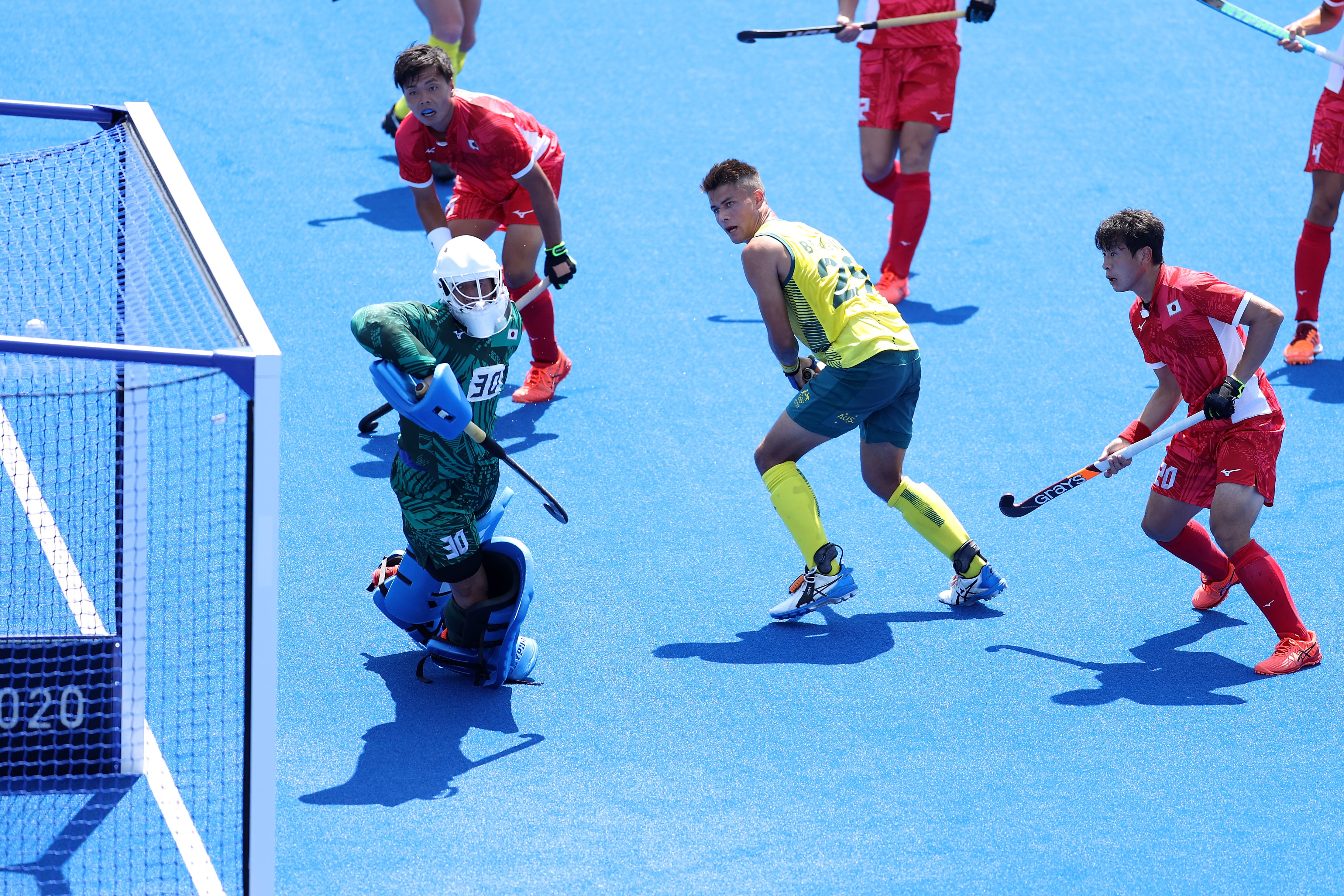 Tim Brand #29 of Team Australia scores a goal against Takashi Yoshikawa #30 of Team Japan during the Men's Pool A match on day one of the Tokyo 2020 Olympic Games at Oi Hockey Stadium on 24 July 2021 in Tokyo, Japan