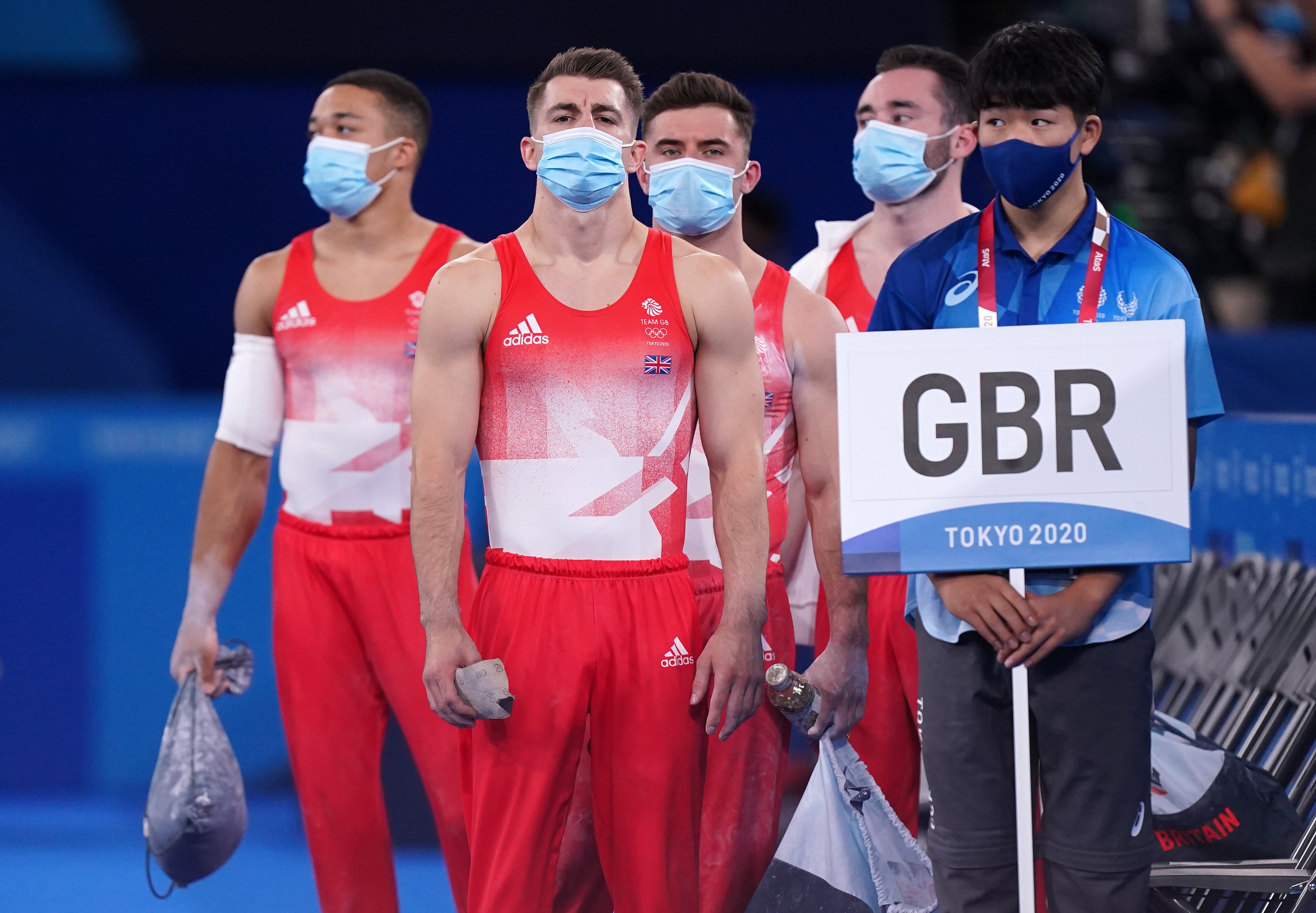 Max Whitlock, second left, gets his gymnastics campaign under way in Tokyo (Mike Egerton/PA)
