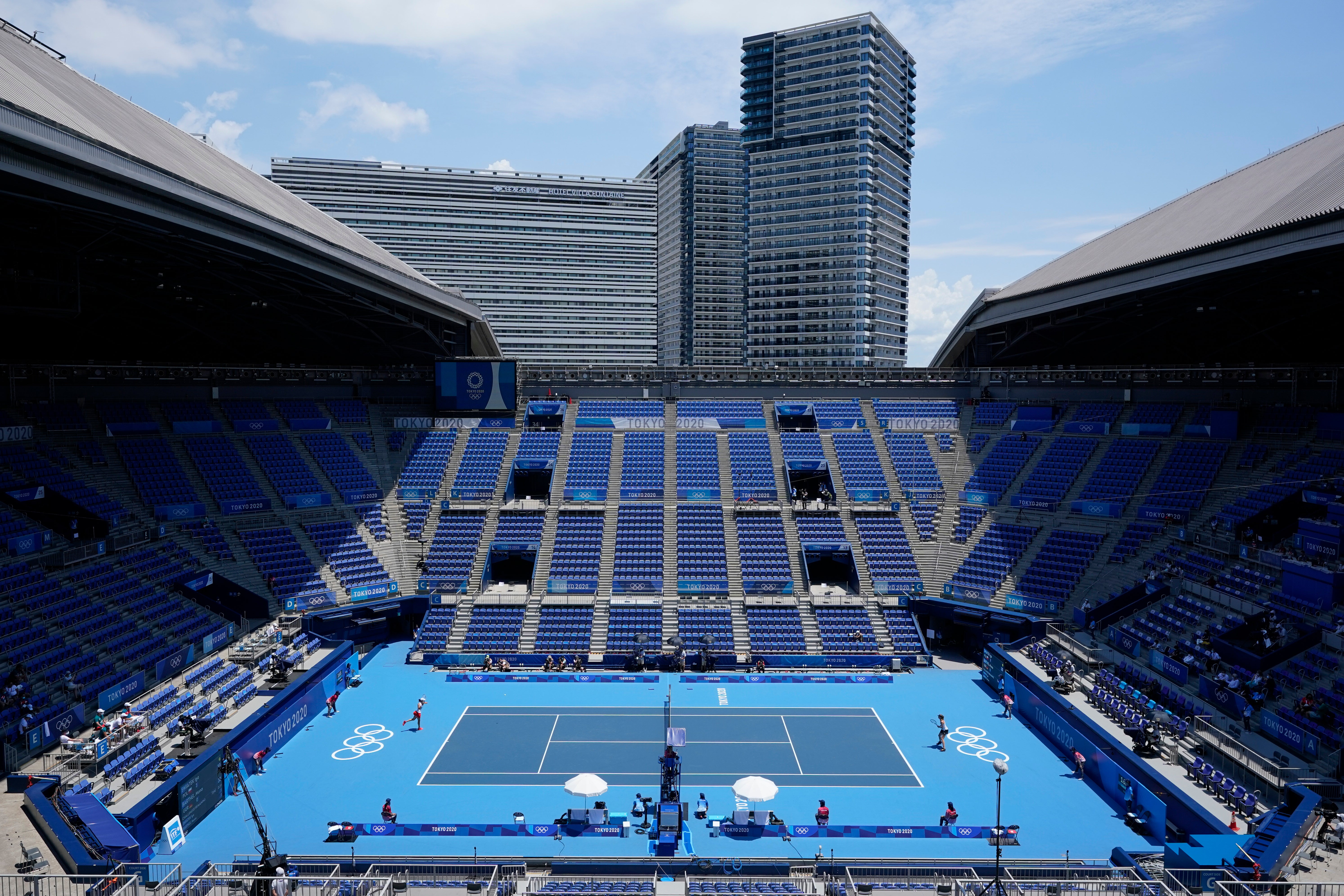 Iga Swiatek and Mona Barthel compete in an empty stadium (Patrick Semansky/AP)