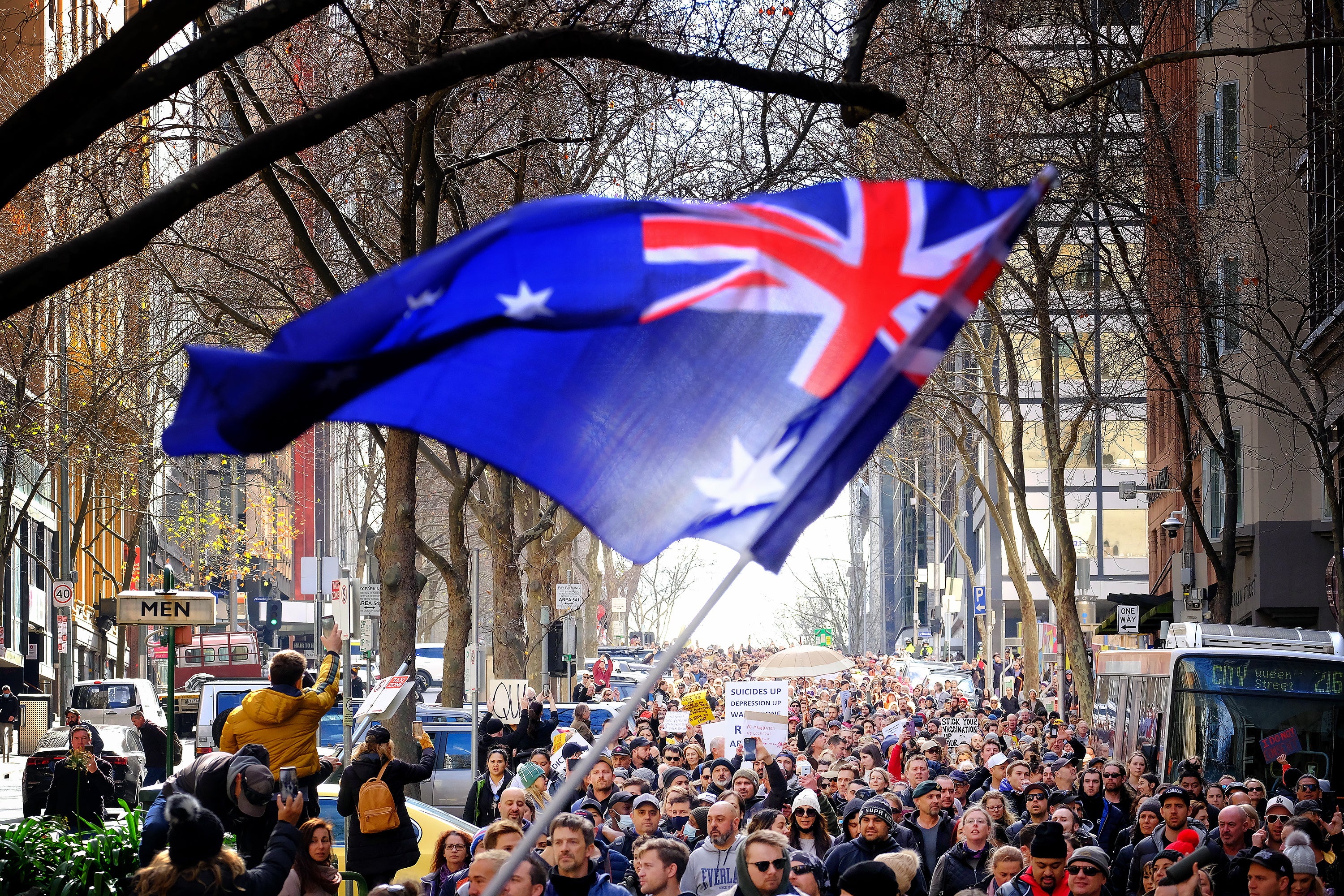 Anti-lockdown protesters march in Melbourne on Saturday