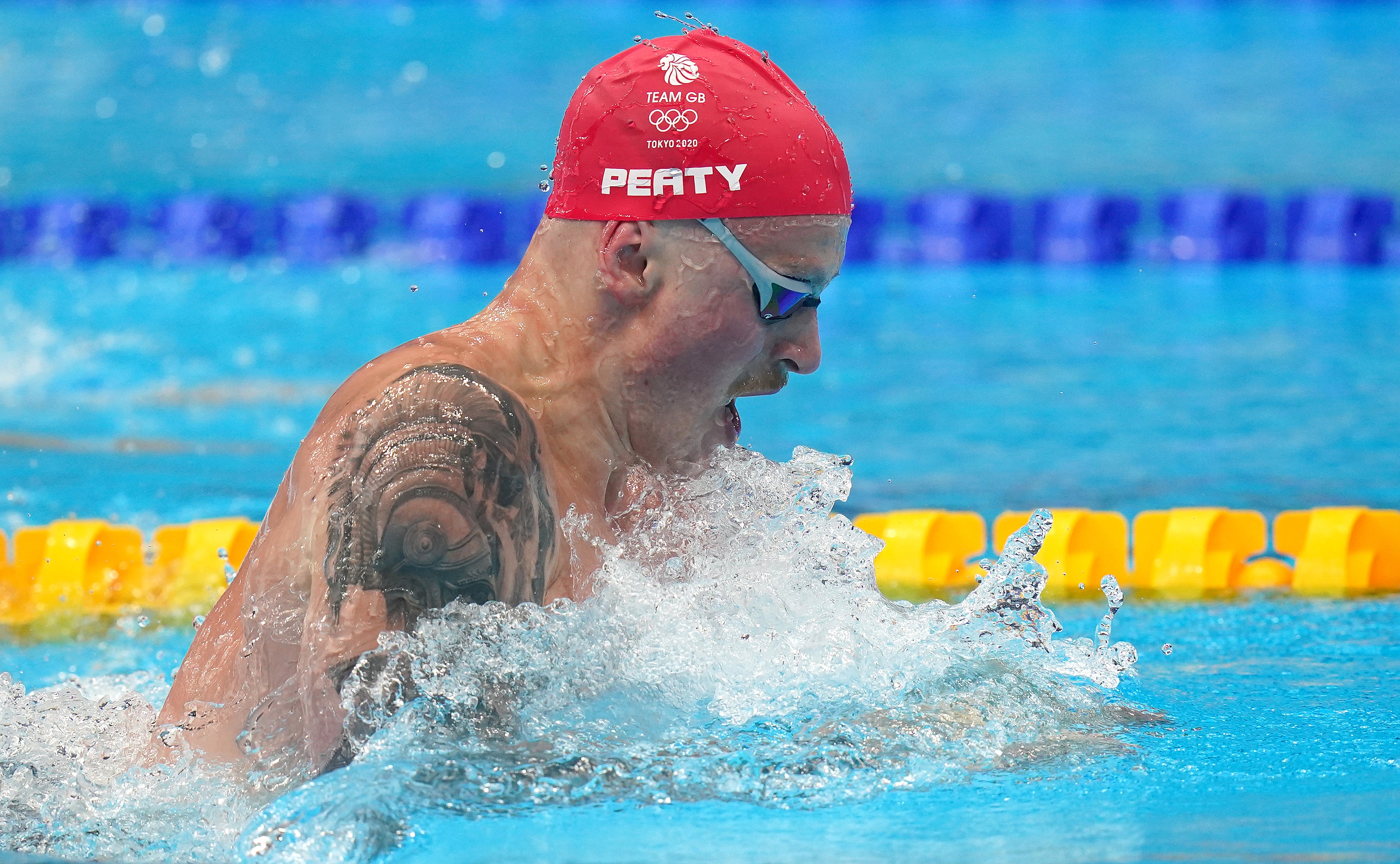 Adam Peaty during his 100m breaststroke heat (Adam Davy/PA)