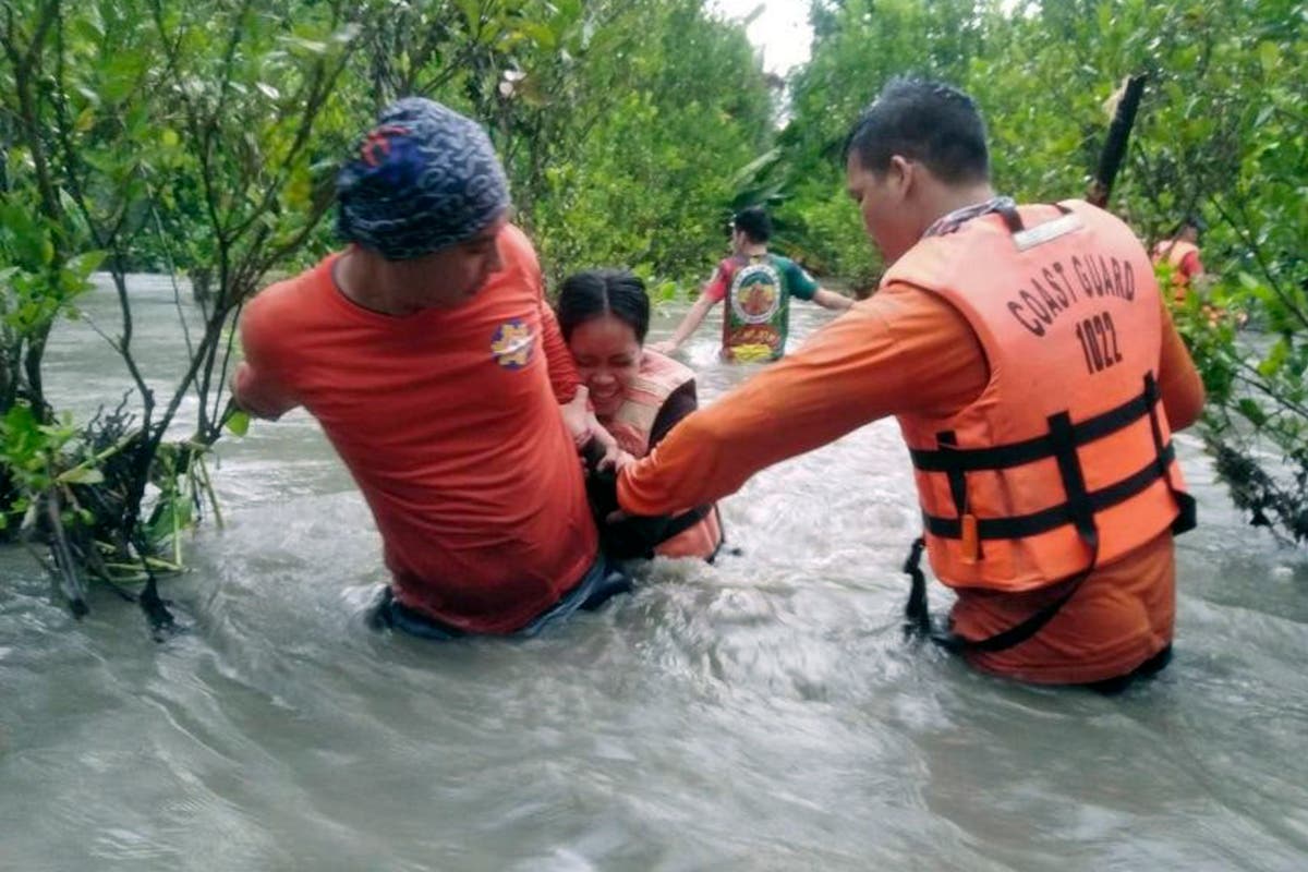 Monsoon rains flood Philippine villages, thousands evacuate