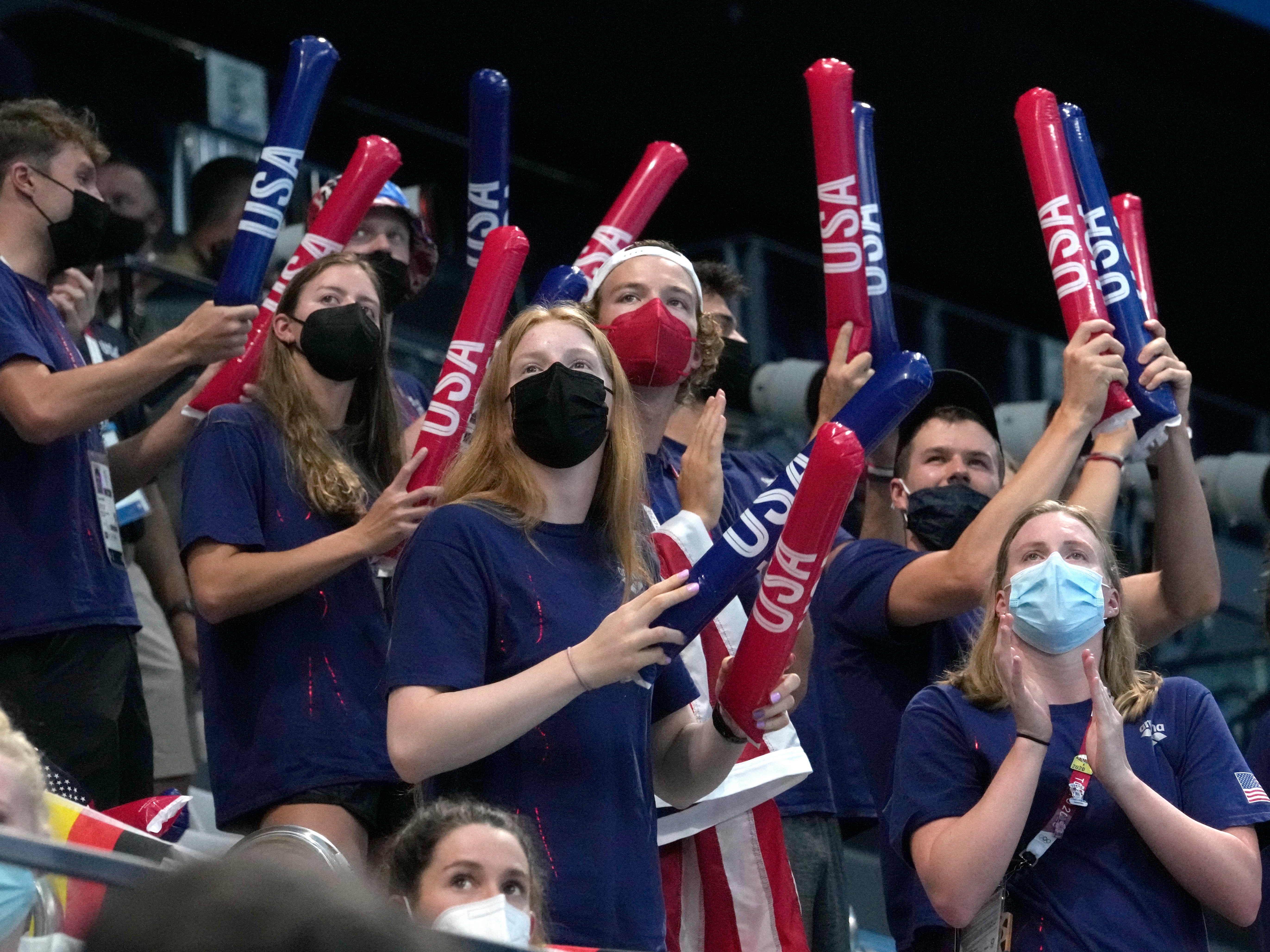 United States swimmers cheer on teammates during swimming competitions at the 2020 Summer Olympics, Saturday, July 24, 2021, in Tokyo, Japan.
