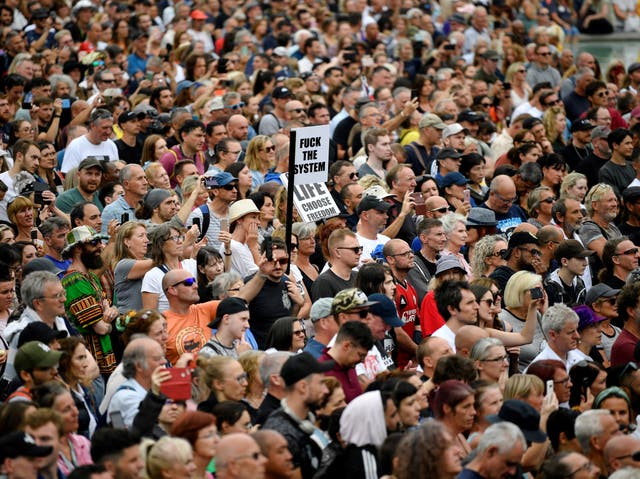 <p>Protesters gather in Trafalgar Square for the ‘World Wide Rally for Freedom"</p>
