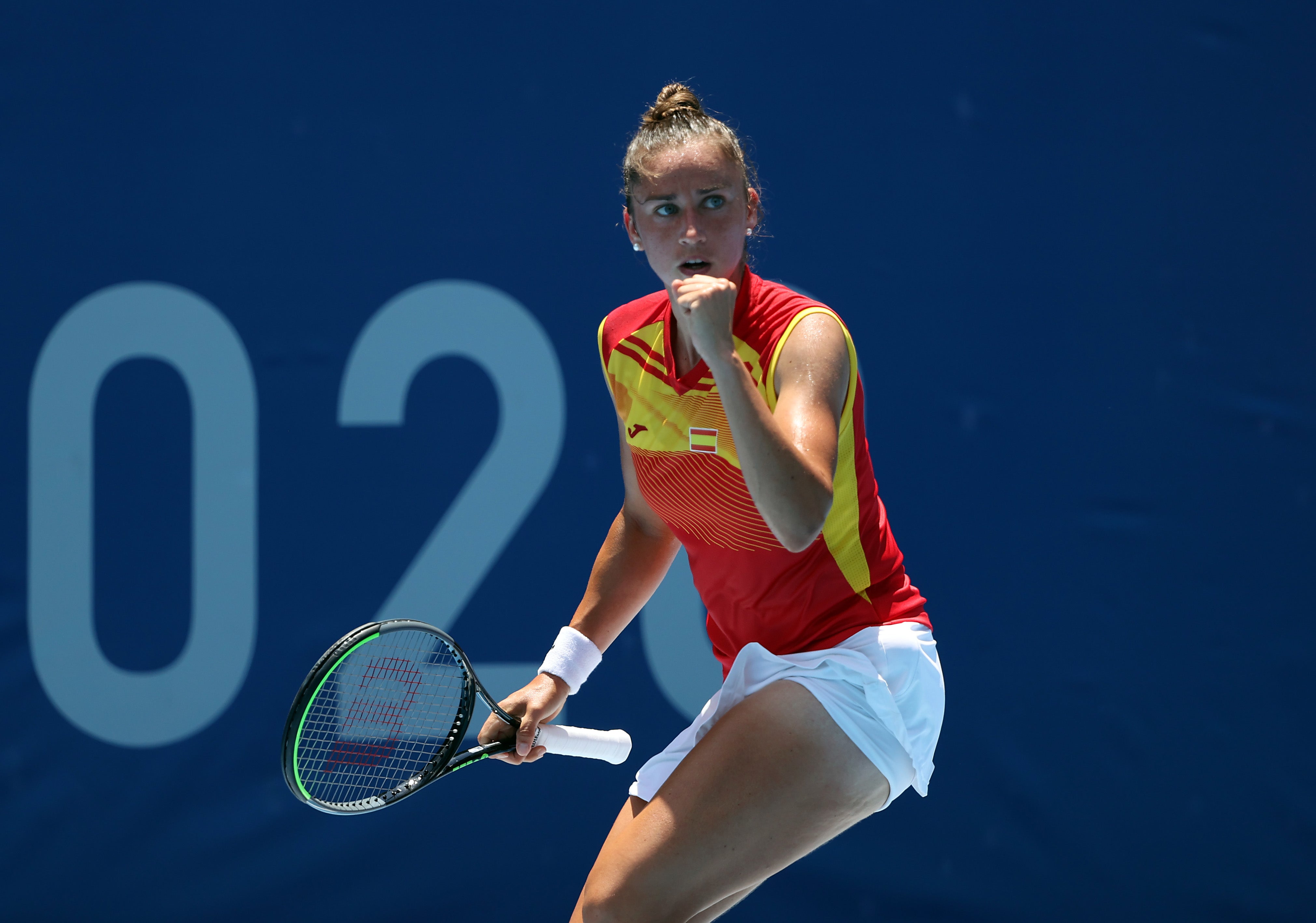 Sara Sorribes Tormo of Team Spain celebrates after a point during her Women's Singles First Round match against Ashleigh Barty of Team Australia on day two of the Tokyo 2020 Olympic Games at Ariake Tennis Park on 25 July 2021 in Tokyo, Japan.