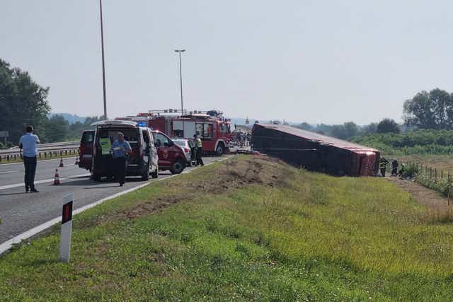 <p>Emergency crews work at the site of a bus accident near Slavonski Brod, Croatia, Sunday, July 25, 2021</p>