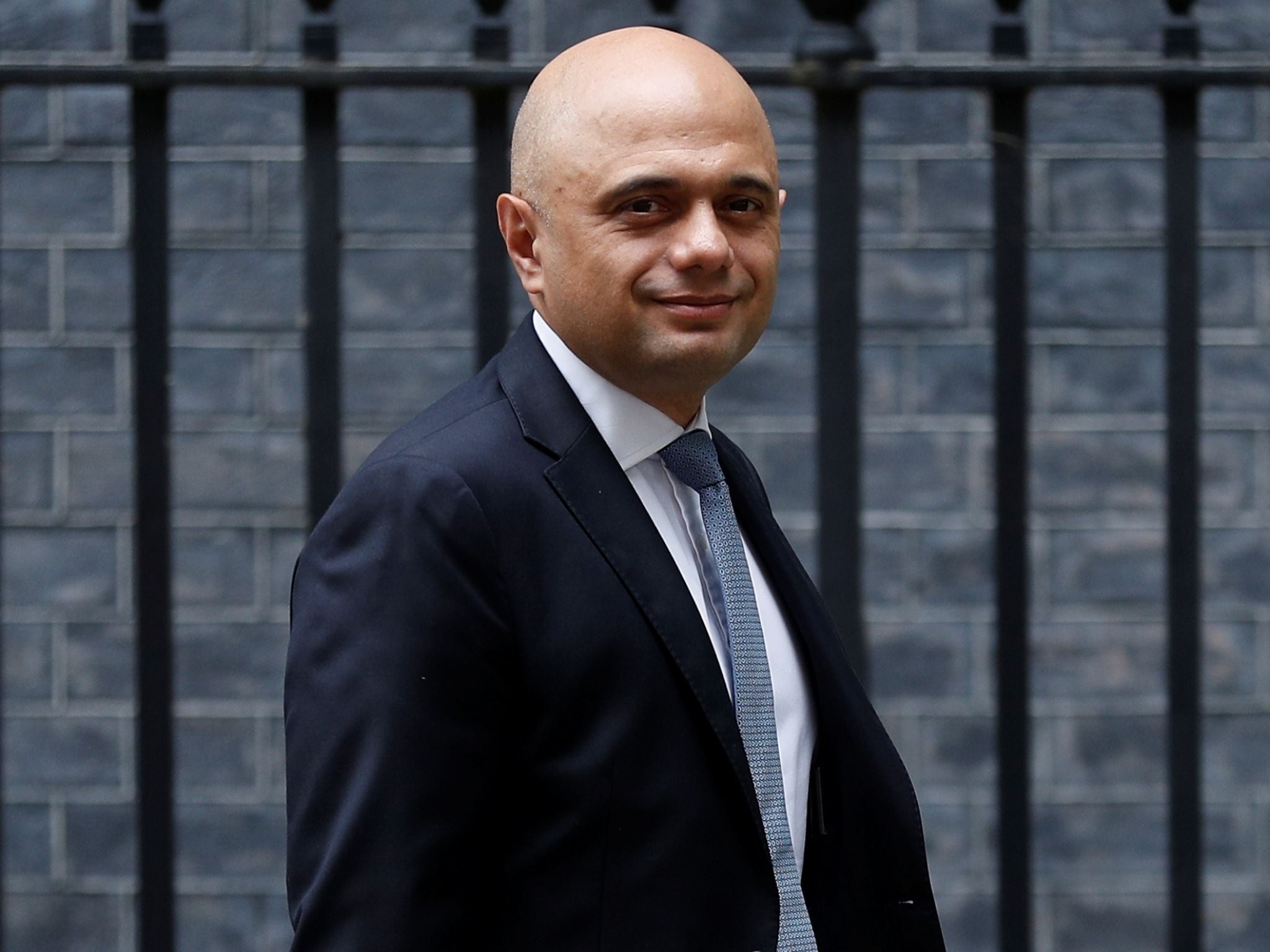 Sajid Javid has apologised over the wording of one of his tweets