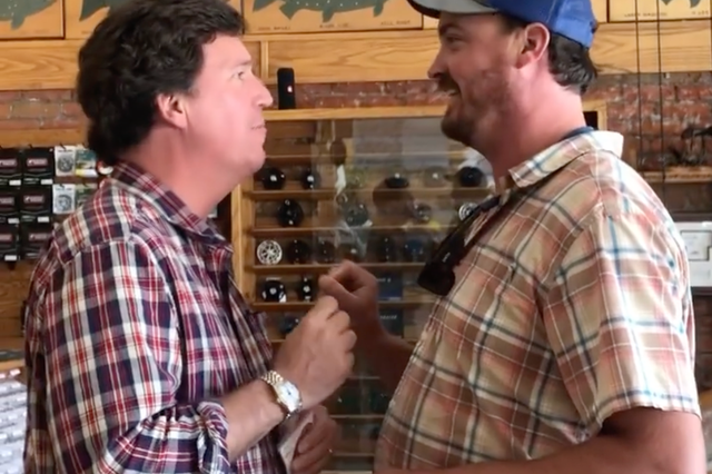 <p>A man posted a video of himself telling Tucker Carlson that he was ‘the worst person alive’ in a fishing goods store in Montana</p>