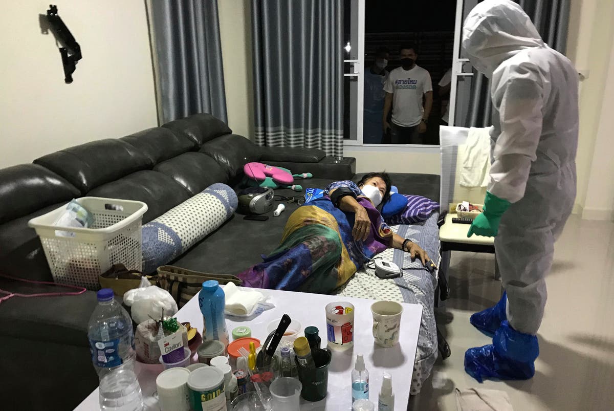 Thai volunteers aid COVID patients in need of care, testing