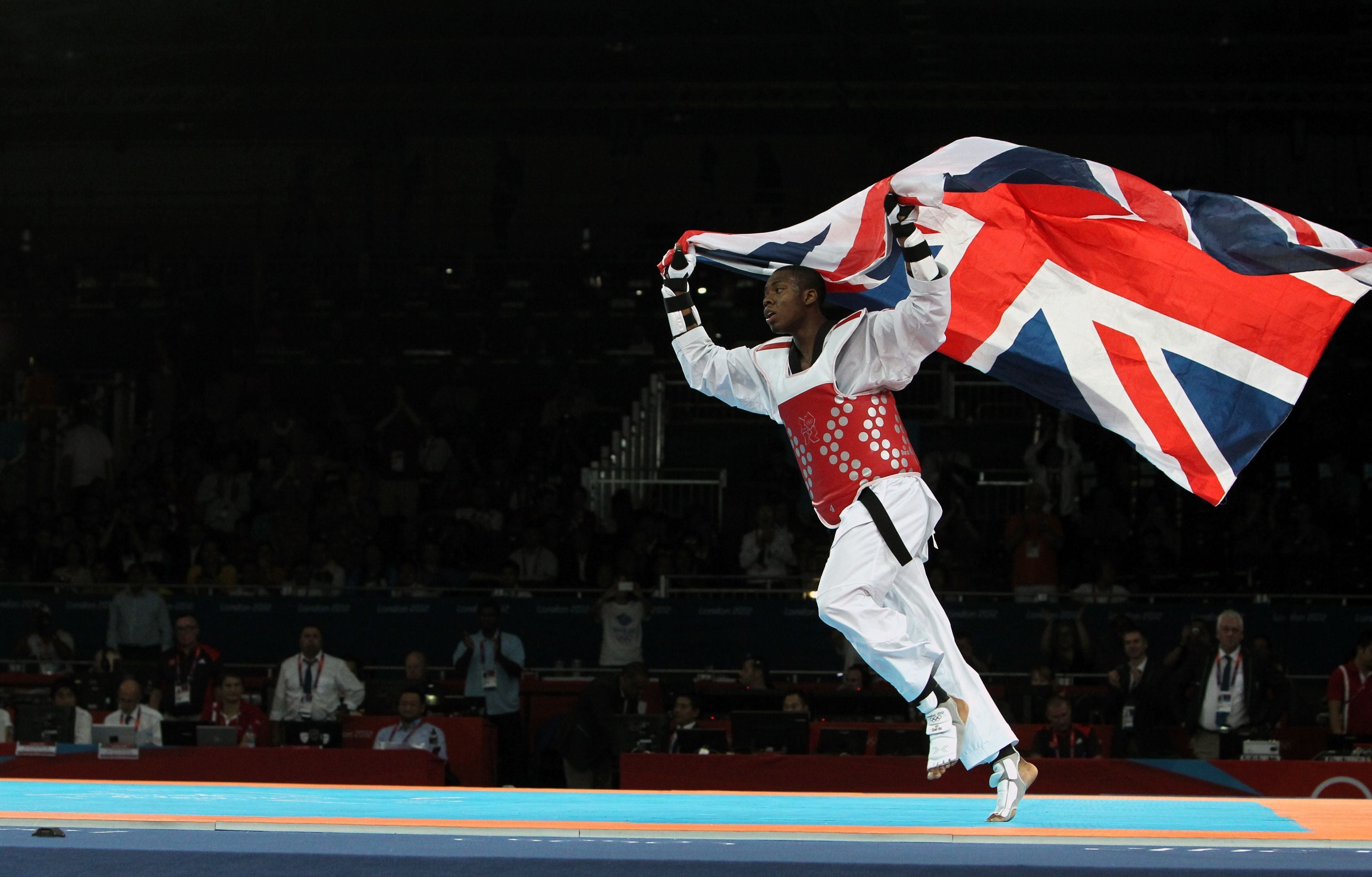 Lutalo Muhammad celebrates after winning bronze in London (Steve Parsons/PA)