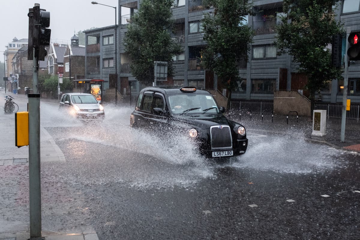 Flash floods hit London as Met Office issue weather warnings - live