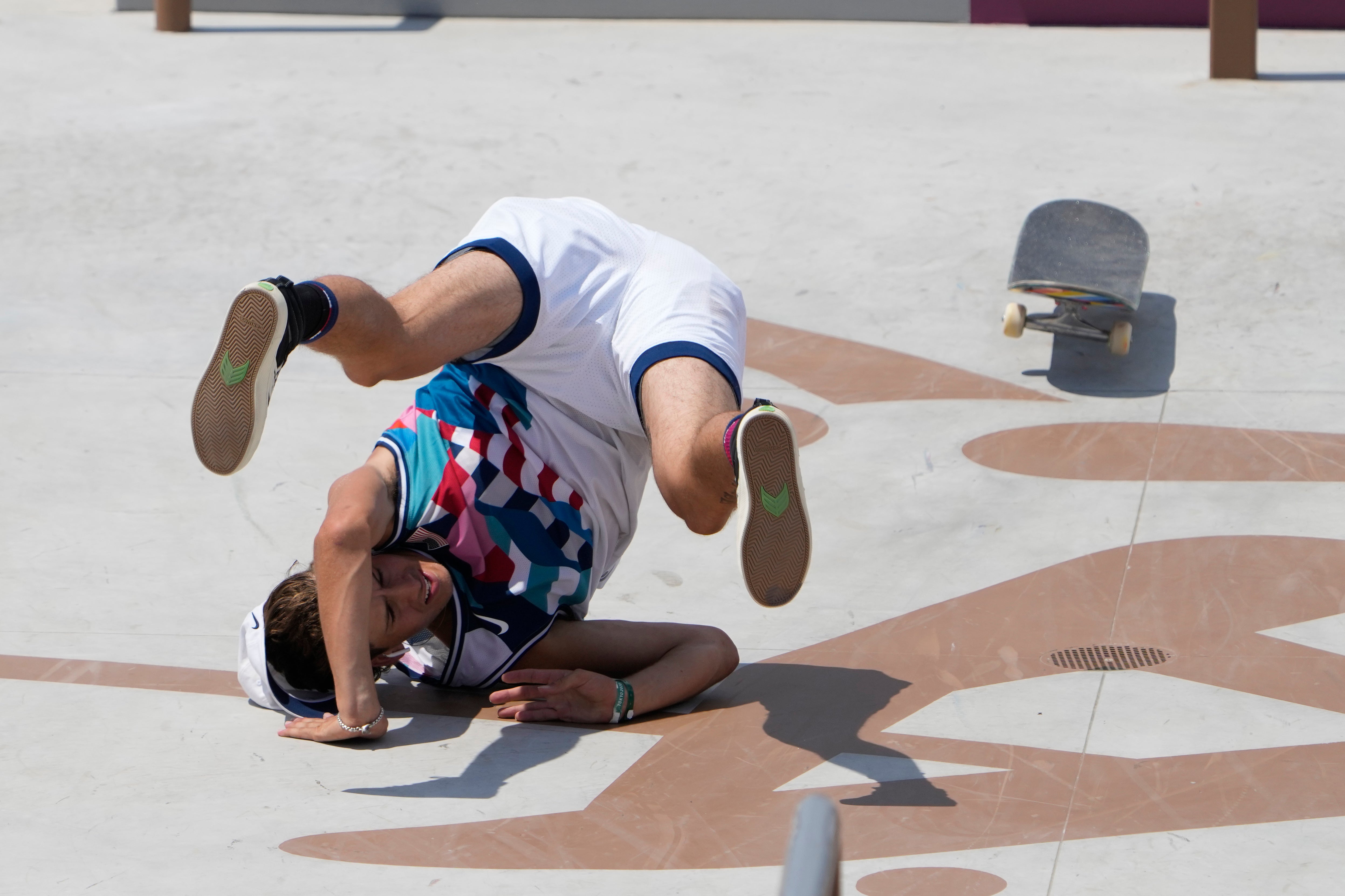 Jagger Eaton of the United States takes a tumble during the men’s street skateboarding final in Tokyo (Jae C. Hong/AP/PA)