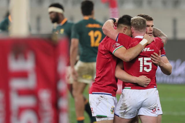British and Irish Lions’ Conor Murray (left), Stuart Hogg (15) and Owen Farrell celebrate after a 22-17 victory over South Africa in the first Test (Halden Krog/PA)