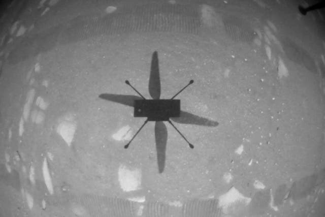 <p>NASA’s Ingenuity Mars Helicopter took this shot while hovering over the Martian surface on April 19, 2021, during the first instance of powered, controlled flight on another planet</p>